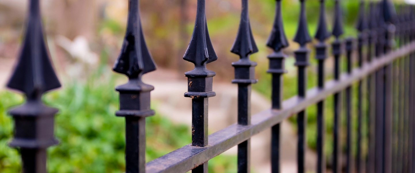 black iron fences with a pinty end